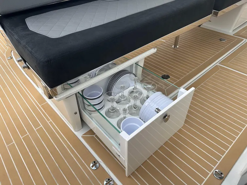 Slide: The Image of Drawer with glassware and dishes on Nimbus Tender 11 #258, 2024 model. - 24