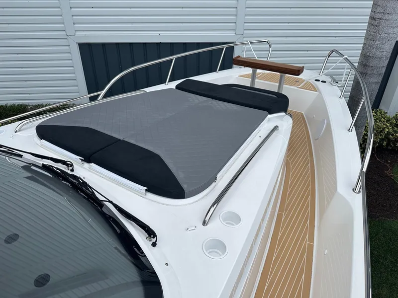 Slide: The Image of 2024 Nimbus Tender 11 #258 boat deck with cushioned seating. - 28