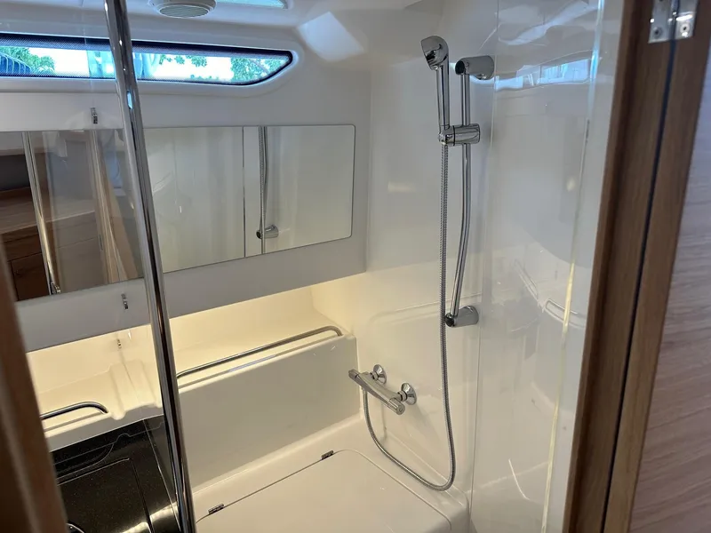 Slide: The Image of Modern bathroom in 2024 Nimbus Tender 11 #258 yacht with shower and mirror. - 31