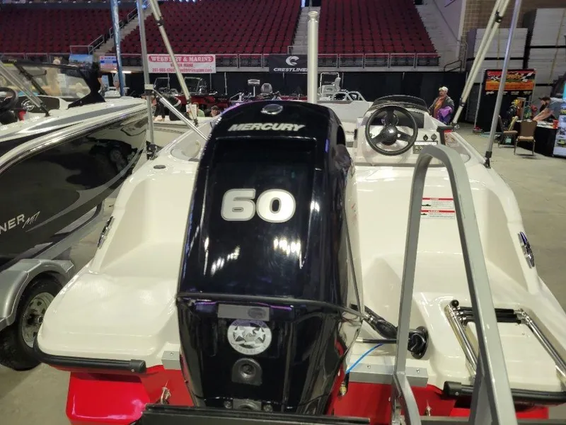Slide: The Image of 2024 Bayliner M15 boat with Mercury 60 engine at a boat show. - 8