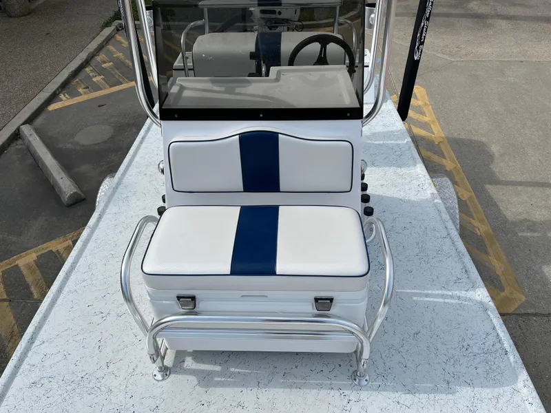Slide: The Image of 2024 Shallow Stalker SS-17 Sportsman boat with white and blue seating. - 10