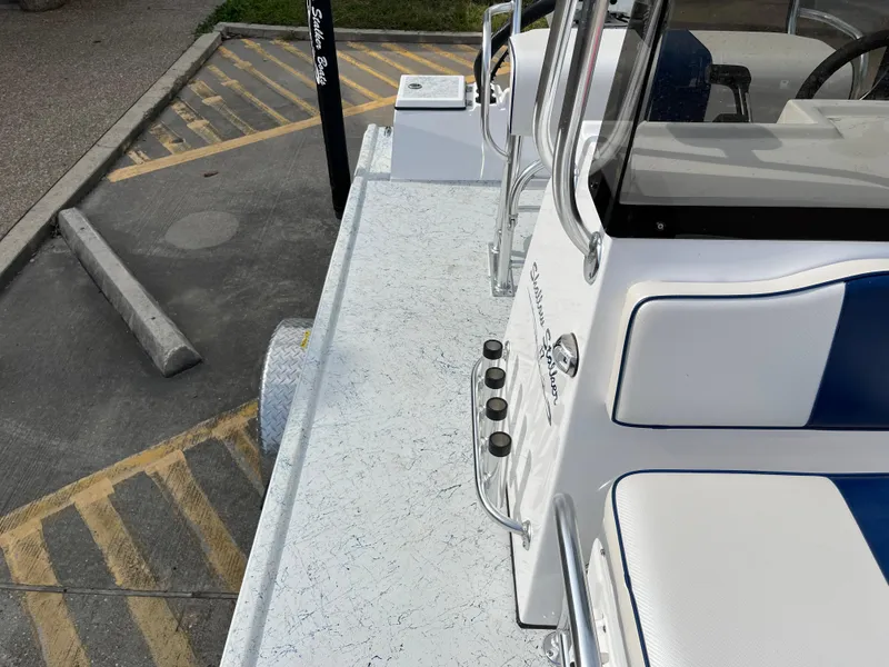 Slide: The Image of 2024 Shallow Stalker SS-17 Sportsman boat interior with white and blue seating. - 11