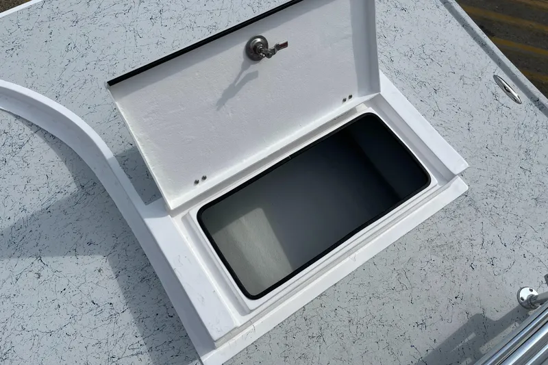 Slide: The Image of Open storage compartment on 2024 Shallow Stalker SS-17 Sportsman boat. - 21
