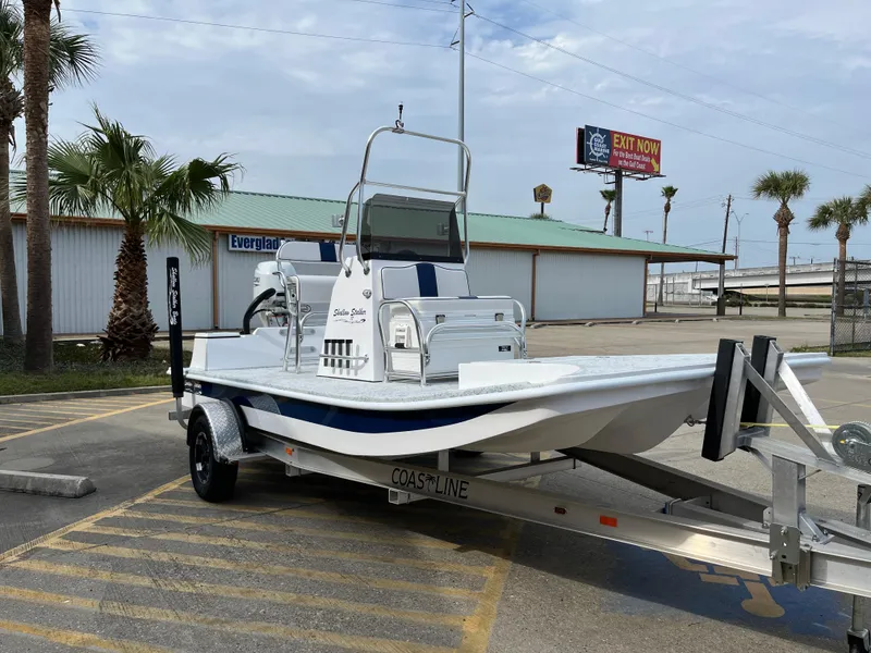 Slide: The Image of 2024 Shallow Stalker SS-17 Sportsman boat on trailer in parking lot. - 4