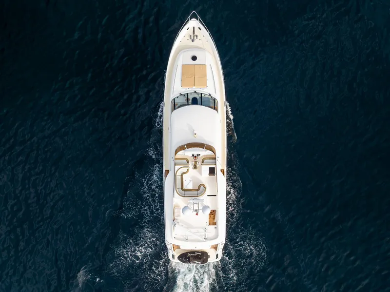 Slide: The Image of Aerial view of a 2002 Viking Princess 72 SportCruiser yacht cruising on the ocean. - 11