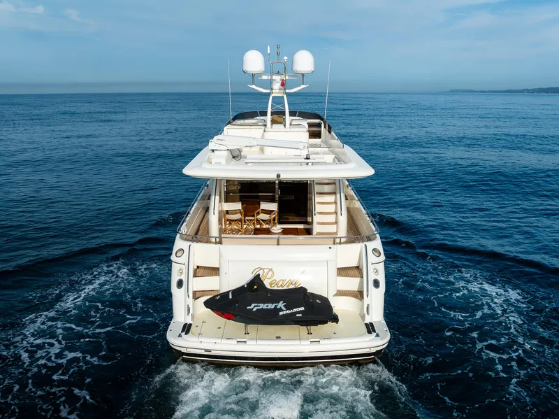 Slide: The Image of 2002 Viking Princess 72 SportCruiser yacht cruising on open water. - 12