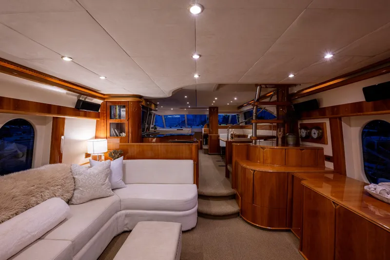Slide: The Image of Luxurious interior of 2002 Viking Princess 72 SportCruiser yacht with elegant wood finishes. - 34