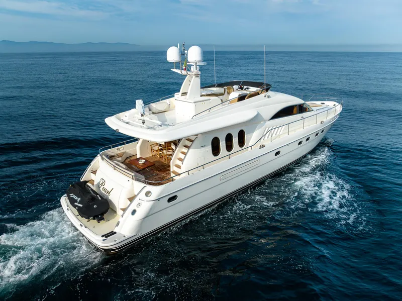 Slide: The Image of 2002 Viking Princess 72 SportCruiser yacht cruising on open water. - 4