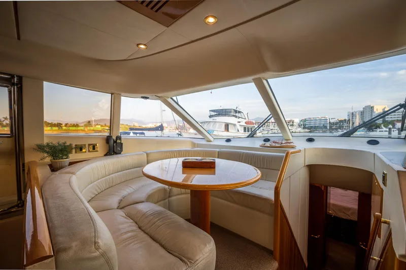 Slide: The Image of Luxurious interior of 2002 Viking Princess 72 SportCruiser yacht with panoramic windows. - 44