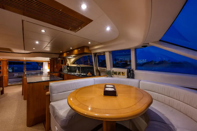 Slide: The Image of Luxurious interior of 2002 Viking Princess 72 SportCruiser yacht with elegant dining area. - 45