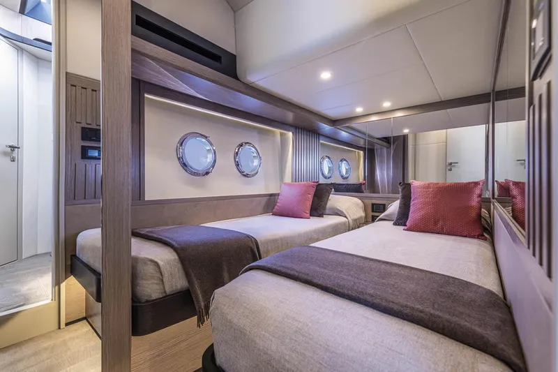 Slide: The Image of Luxurious twin cabin interior of 2027 Absolute 53 Navetta yacht with modern design elements. - 13
