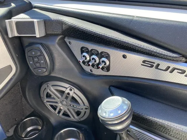 Slide: The Image of 2016 Supra SA 400 boat dashboard with controls and speaker. - 17
