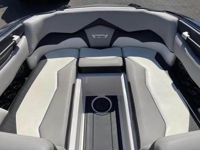 Slide: The Image of 2016 Supra SA 400 boat interior with gray and white seating. - 19