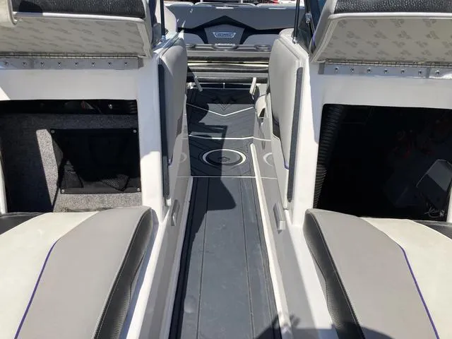 Slide: The Image of 2016 Supra SA 400 boat interior with gray and black seating. - 20