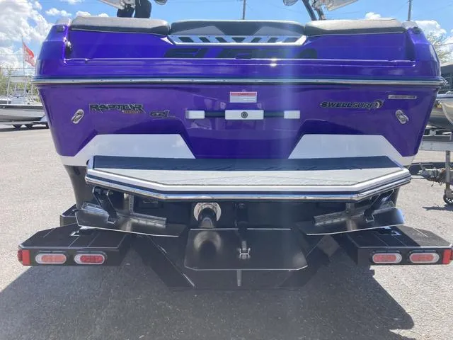 Slide: The Image of 2016 Supra SA 400 boat rear view with Raptor engine and Swell Surf system. - 3