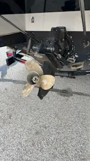 Slide: The Image of 2001 Ebbtide 2500 Mid-Cabin Cruiser propeller and stern drive. - 9