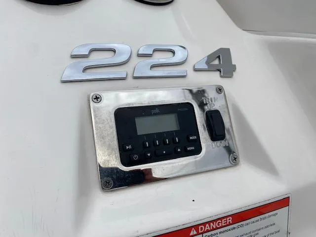 Slide: The Image of 2018 Chaparral 224 Sunesta control panel and model number. - 17
