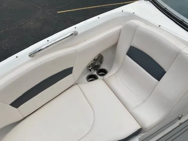 Slide: The Image of 2018 Chaparral 224 Sunesta boat interior seating with cup holders. - 31