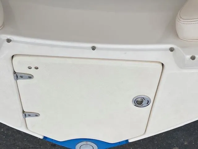 Slide: The Image of 2018 Chaparral 224 Sunesta boat storage compartment. - 32