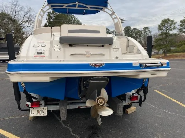 Slide: The Image of 2018 Chaparral 224 Sunesta boat rear view with propeller and trailer. - 9