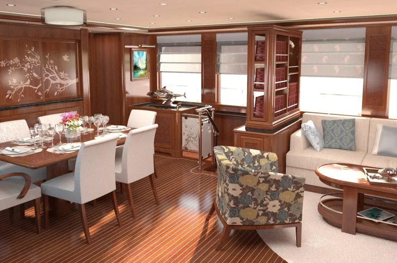Slide: The Image of Luxurious interior of 2026 Selene 72 Ocean Explorer yacht with elegant dining and seating area. - 9