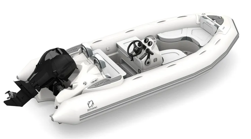 Slide: The Image of 2024 Zodiac Yachtline 440 inflatable boat with outboard motor and sleek design. - 5