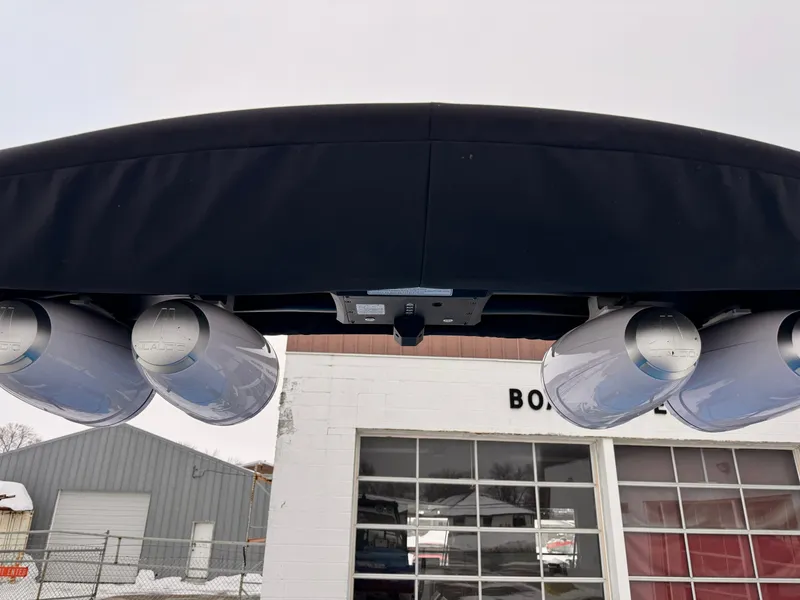 Slide: The Image of 2021 Supra SR boat with tower speakers in front of a garage. - 17
