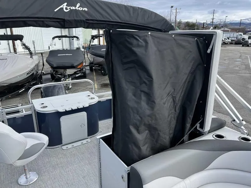 Slide: The Image of 2024 Avalon 2385 25 LSZ Fish RF pontoon boat interior with seating and storage. - 14