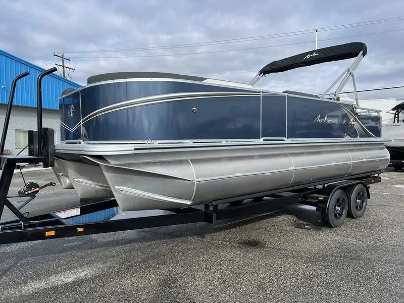 Slide: The Image of 2024 Avalon 2385 25 LSZ Fish RF pontoon boat on a trailer. - 4