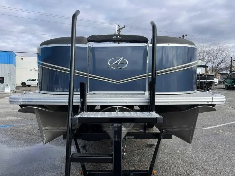 Slide: The Image of 2024 Avalon 2385 25 LSZ Fish RF pontoon boat, rear view with ladder. - 7