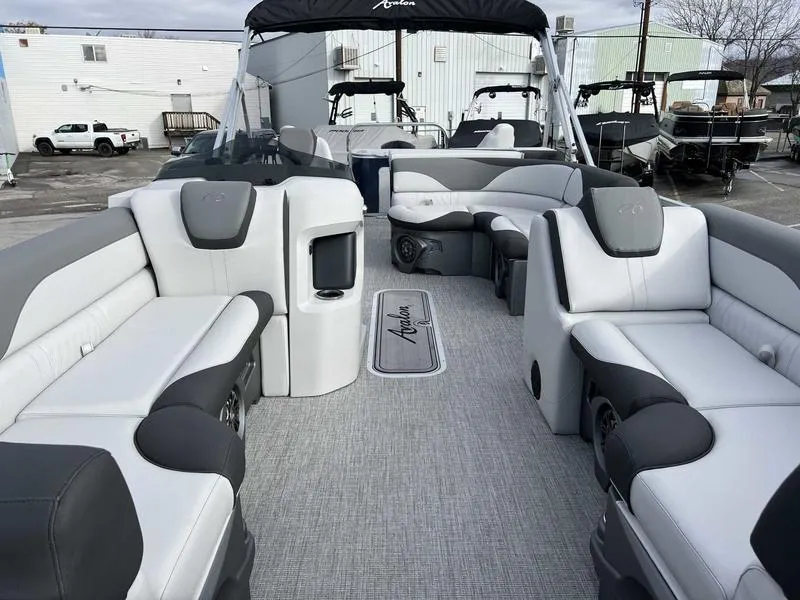 Slide: The Image of 2024 Avalon 2385 25 LSZ Fish RF pontoon boat interior with luxurious seating. - 9