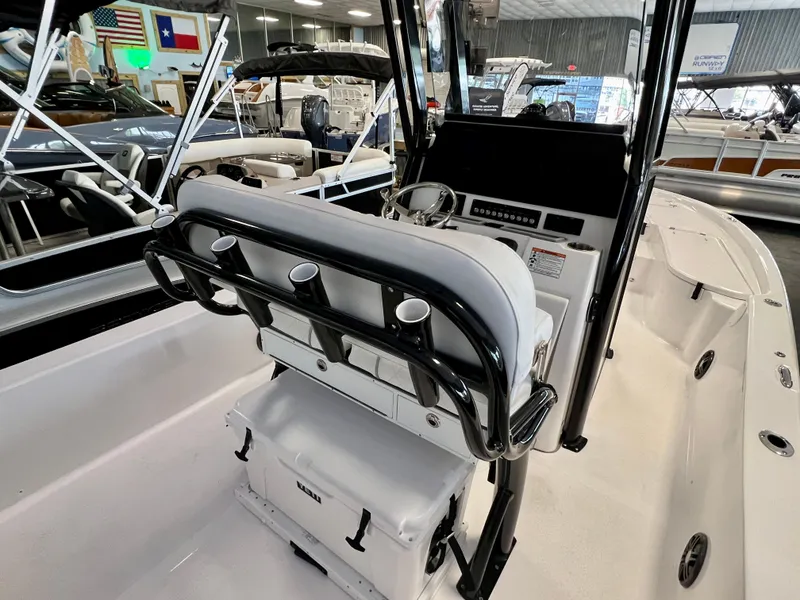 Slide: The Image of 2024 Sea Fox 251 Bay boat interior with console and seating. - 10