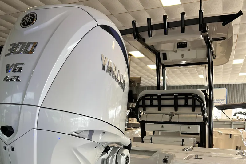 Slide: The Image of 2024 Sea Fox 251 Bay boat with Yamaha 300 V6 outboard motor. - 2