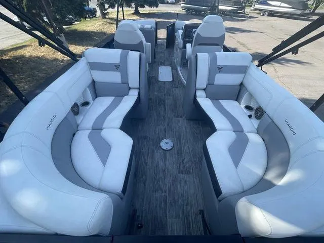 Slide: The Image of 2022 Viaggio D23U boat interior with white and gray seating. - 12