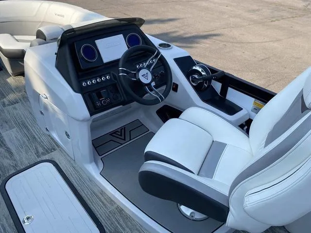 Slide: The Image of 2022 Viaggio D23Q boat cockpit with modern steering wheel and control panel. - 7