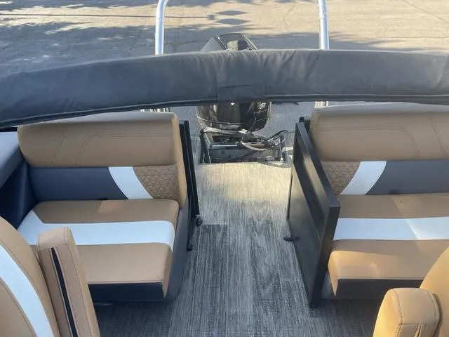 Slide: The Image of Interior of 2022 Viaggio D23Q boat with tan and white seating. - 12