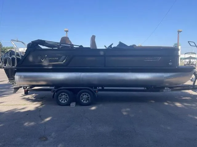 Slide: The Image of 2022 Viaggio D23Q pontoon boat on a trailer in a parking lot. - 3