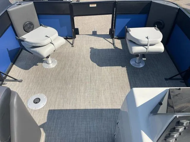 Slide: The Image of 2023 Viaggio L20F boat interior with two swivel seats and carpeted floor. - 11