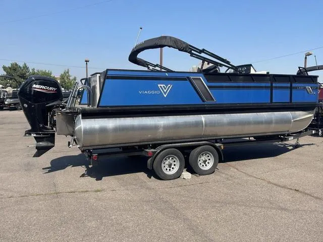 Slide: The Image of 2023 Viaggio L20F pontoon boat on trailer with Mercury outboard motor. - 4