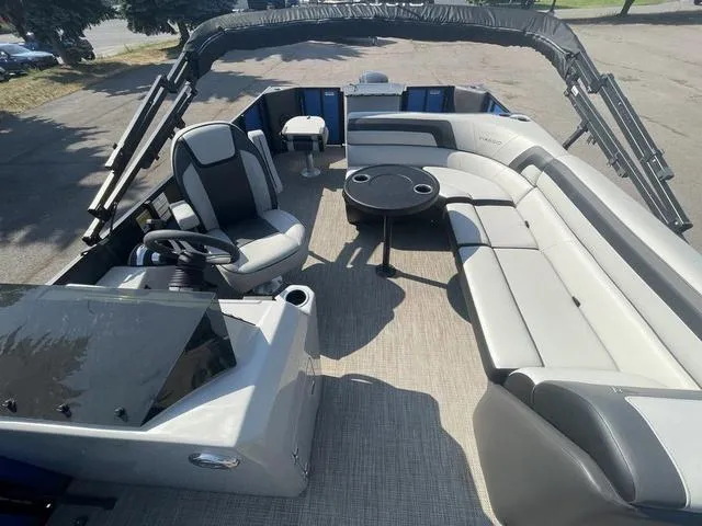 Slide: The Image of 2023 Viaggio L20F pontoon boat with spacious seating and modern helm. - 9