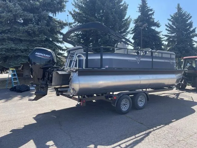 Slide: The Image of 2023 Viaggio DM20C pontoon boat on trailer with Mercury outboard motor. - 5