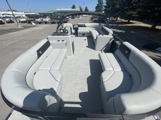 Slide: The Image of 2023 Viaggio DM20C pontoon boat with spacious seating and modern design. - 9