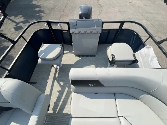 Slide: The Image of 2023 Viaggio DM18F pontoon boat interior with seating and helm station. - 11