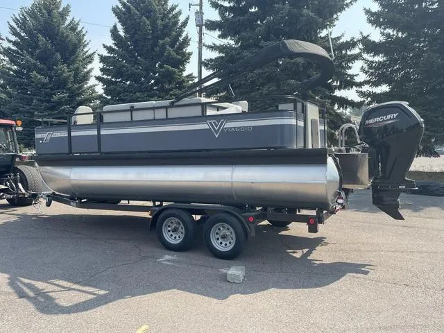 Slide: The Image of 2023 Viaggio DM18F pontoon boat on trailer with Mercury outboard motor. - 6