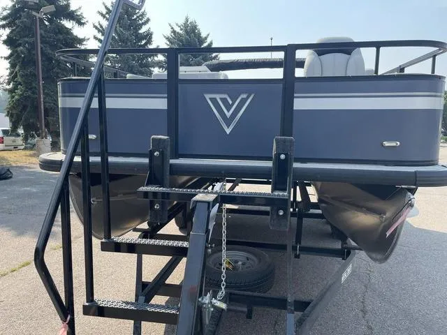 Slide: The Image of 2023 Viaggio DM18F pontoon boat on trailer, rear view with ladder. - 8