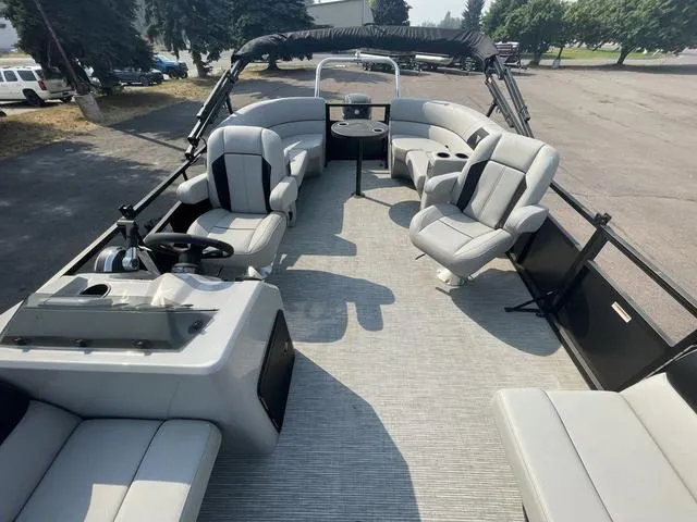 Slide: The Image of 2023 Viaggio DM18U pontoon boat with spacious seating and modern design. - 10