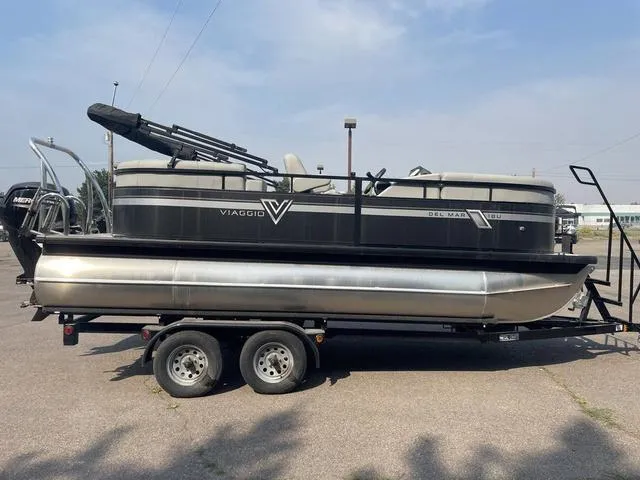 Slide: The Image of 2023 Viaggio DM18U pontoon boat on a trailer. - 2