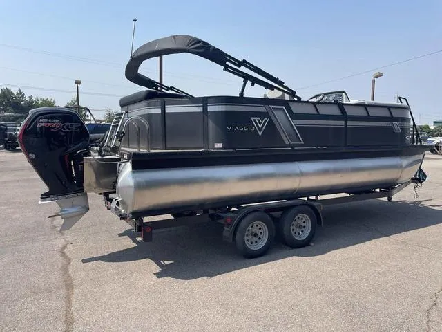 Slide: The Image of 2023 Viaggio L20C pontoon boat on a trailer with a Mercury Pro XS outboard motor. - 3