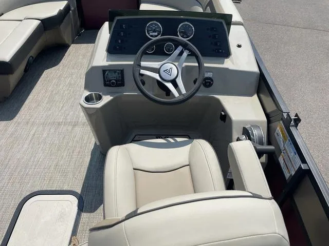 Slide: The Image of 2023 Viaggio l20u boat cockpit with steering wheel and control panel. - 13