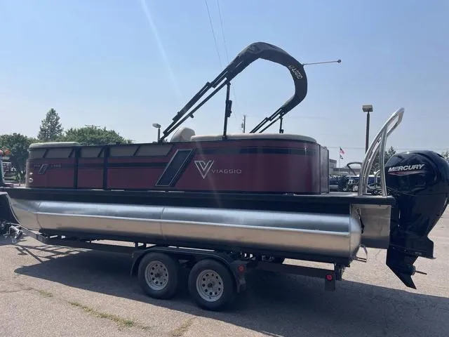 Slide: The Image of 2023 Viaggio l20u pontoon boat on trailer with Mercury outboard motor. - 5